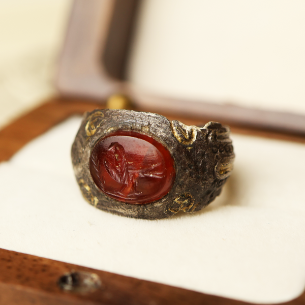 Roman Silver Ring with Garnet Intaglio of a Bird
